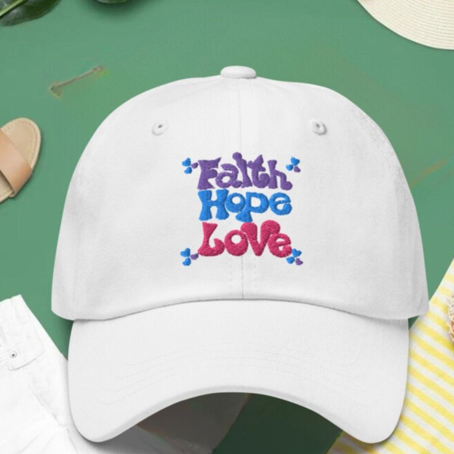 Embrace the powerful message of mental health awareness with our beautifully embroidered "Faith Hope Love" hat, designed for women who want to spread positivity and self-love. White hat.