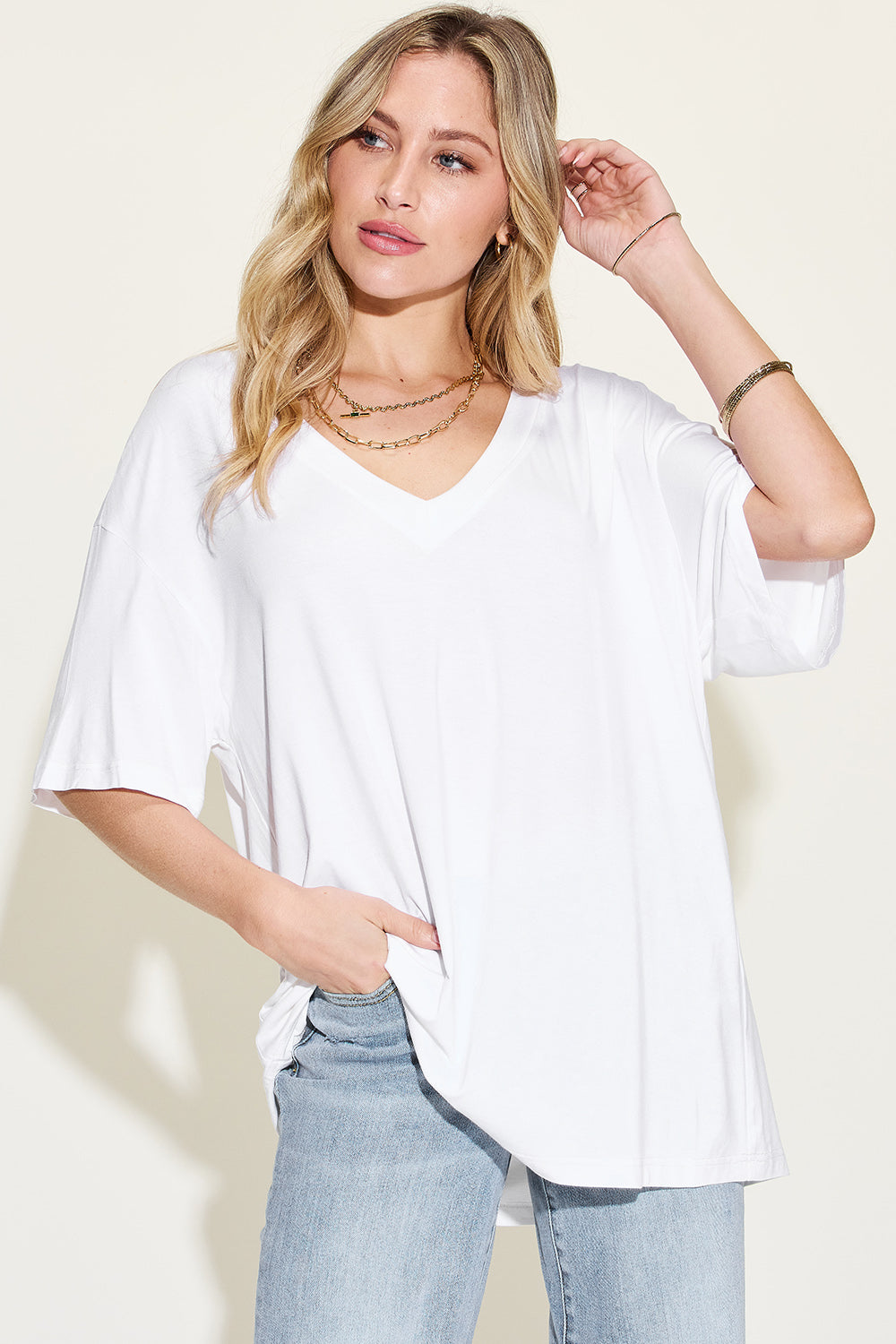 Women's V-Neck Drop Shoulder Top. White.