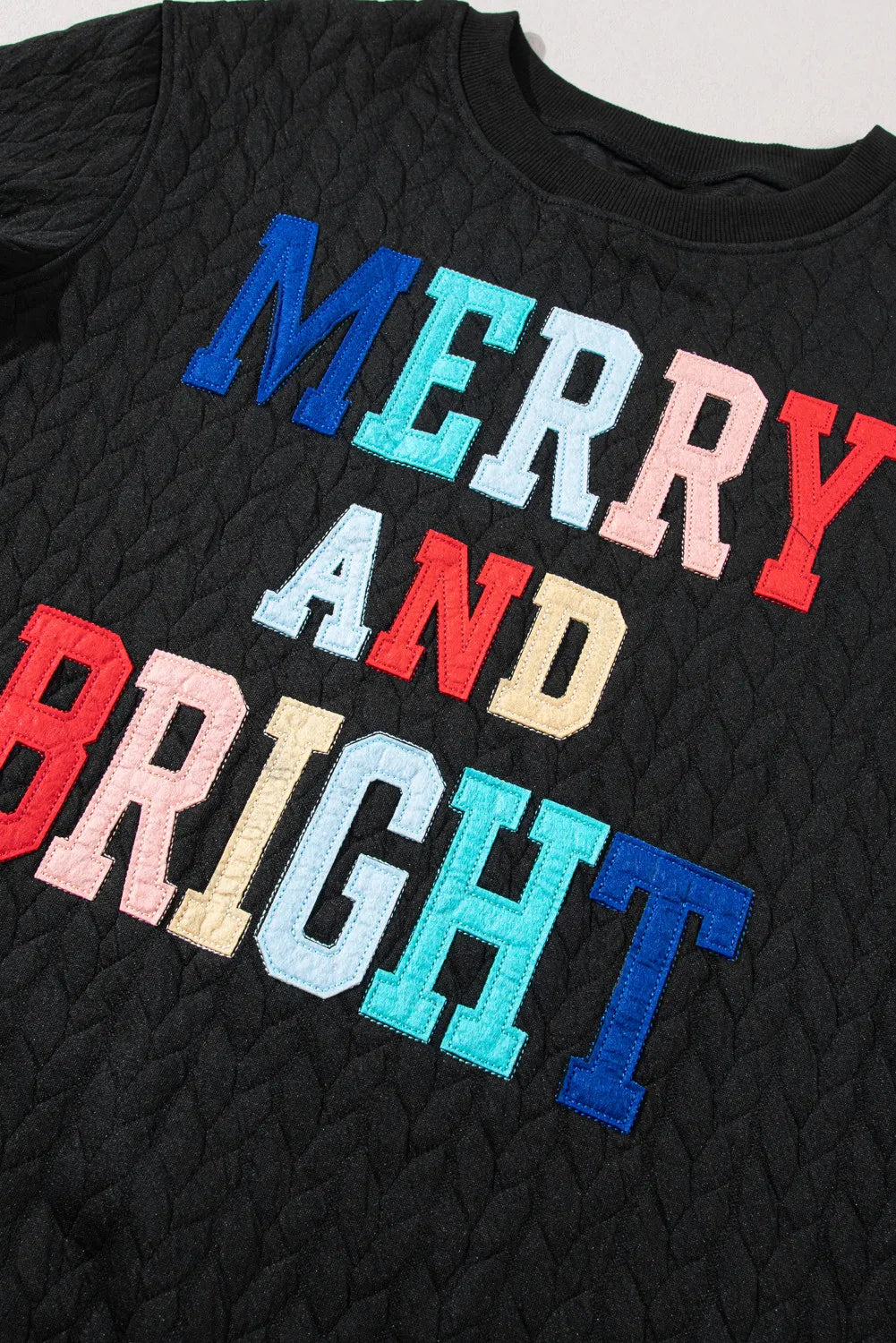 Merry And Bright Pullover Sweatshirt. Black.