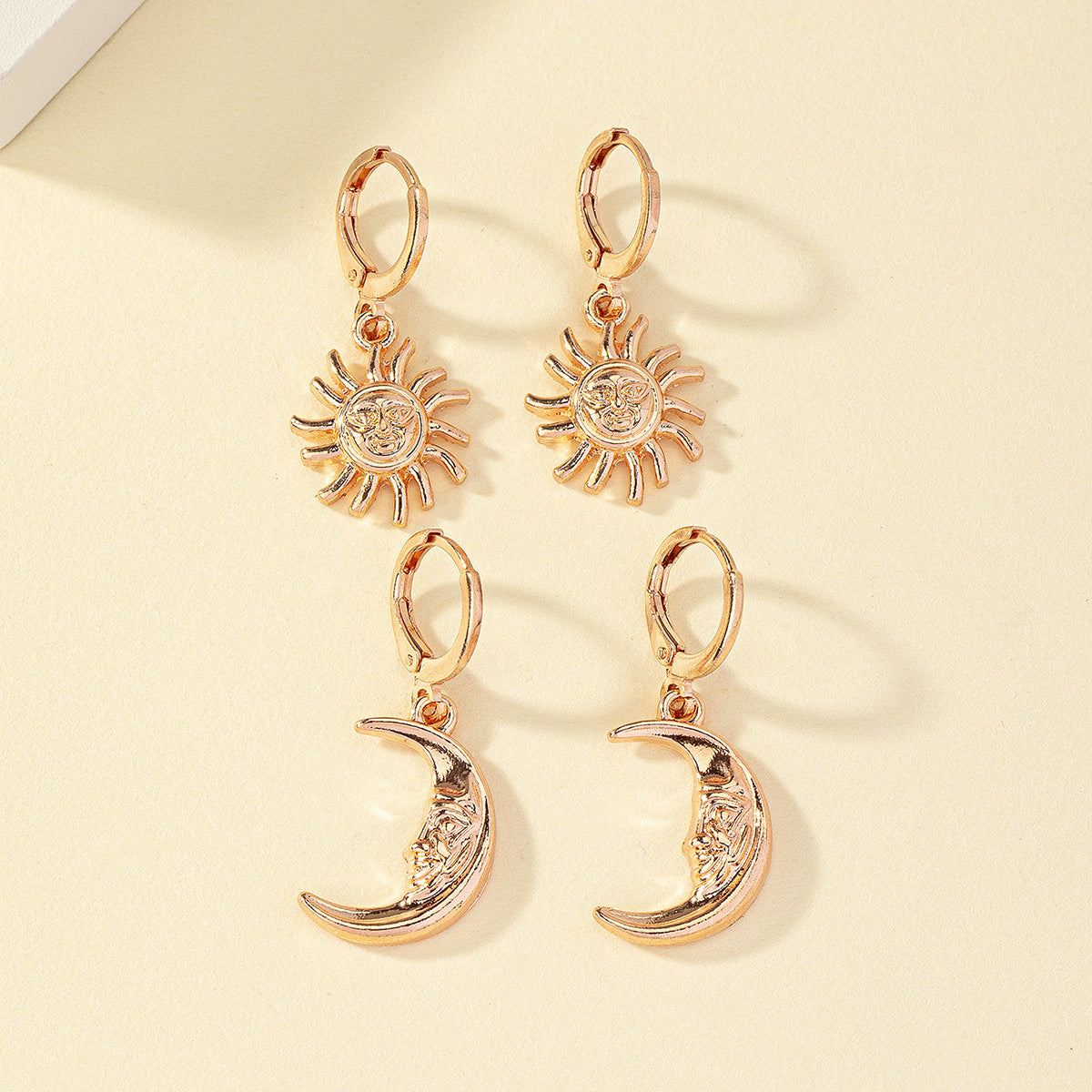 Women's Trendy Sun & Moon Earrings. Rose Gold Color.