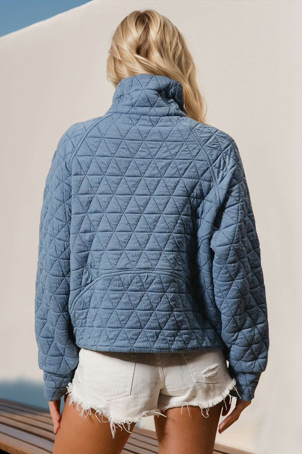 Quilted Sweatshirt with Pocket. Light Blue back side.